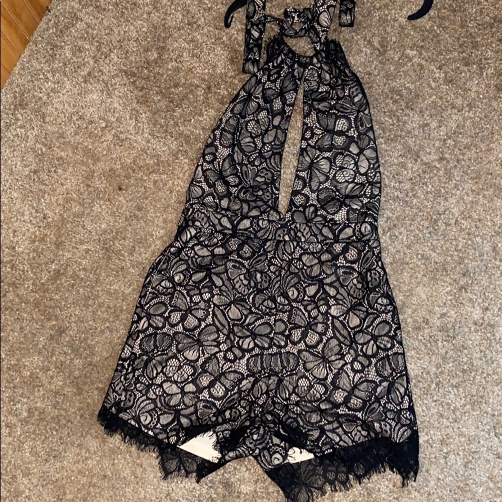 Black lace and nude romper